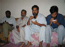 Four of the seven hostages from India, Kenya and Egypt are seen at an undisclosed location just before their release on Wednesday