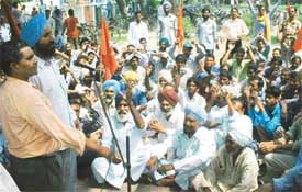 Activists of the CPM raise slogans against the "anti-farmer" policies of the government in Ludhiana