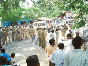 Cops try to pacify angry villagers at Garhi Kotahan near Raipur Rani on Thursday