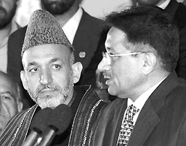 Afghanistan Interim President Hamid Karzai with Pakistan President General Pervez Musharraf