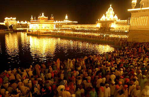 The Sikhs crowd the holy Golden Temple in the Amritsar on August 31 for the 400th anniversary celebration of the compilation and installation of the Sikh sacred book.