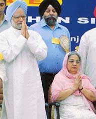 Prime Minister Manmohan Singh and his wife Gursharan Kaur during the inauguration of the Guru Granth Sahib Research Centre at Gurdwara Rakab Ganj in New Delhi