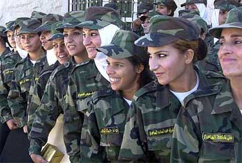 New Iraqi women soldiers pose after their graduation ceremony
