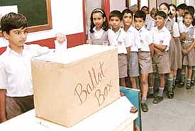 Students of DAV Public School, Phase X, Mohali, queue up to vote for their favourite teacher on Friday.