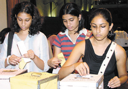 Students of Miranda House casting their vote during the DUSU elections in the Capital on Friday.