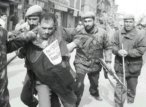 The police drags a Kashmiri human rights leader in Srinagar. The repressive laws have caused more alienation in Kashmir than lack of autonomy.