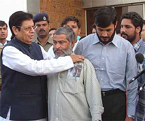 E. Ahamed, Minister of State for External Affairs, welcomes Tilak Raj, Antaryami and Sukhdev on their arrival at Indira Gandhi International Airport, in New Delhi on Friday. 