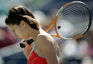 Anastasia Myskina of Russia reacts after missing a point against compatriot Anna Chakvetadze during the US Open