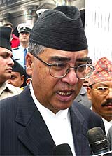 Nepals Prime Minister Sher Bahadur Deuba speaks to the media in Kathmandu on Friday