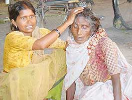 Madhuri, whose grandson was crushed to death by a Punjab Police vehicle, being consoled by a relative in Chandigarh on Saturday.