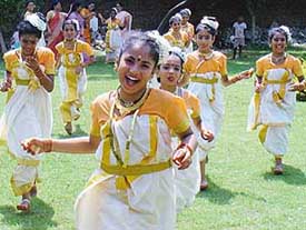 School children perform Thiruvthira dance at Onam celebrations organised by the Ayyappa Sewa