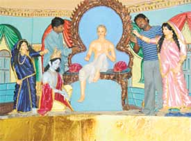 Artists give finishing touches to idols at Chaitanya Gaudiya Math, Sector 20, in connection with Janmashtami celebrations