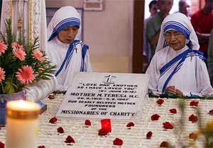 Sister Nirmala, the successor to the late Mother Teresa, prays besides her tomb on the seventh anniversary of her death in Kolkata on Sunday.  