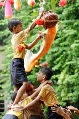 Boys from National School for the Blind break a handi on the eve of Janmashtmi in Mumbai 