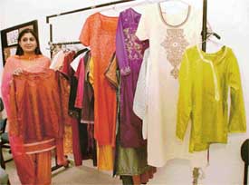 Ms Simrita, faculty member, NIIFT, shows new khadi designs created at the institute 