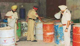 Methanol drums seized by the police in Ludhiana