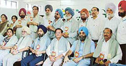 Eminent educationist being honoured at D.D. Jain College in Ludhiana on Wednesday by members of the Rotary Club (North). 