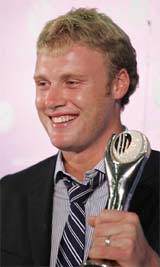 Englands Andrew Flintoff holds his award after being named ODI Player of the Year at the ICC Awards ceremony 