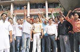 Activists of PUSU and students of the Pharmacy Department, Panjab University, raise slogans against the university authorities during their strike