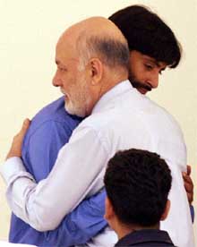 Pakistan High Commissioner to India Aziz Ahmed Khan greets Kashmir separatist leader Yasin Malik