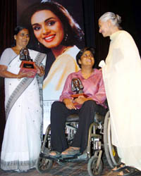 Mrs Rama Bhanot, mother of Neerja Bhanot, congratulates the recipients of the Neerja Bhanot Award at a ceremony organised at Tagore Theatre 