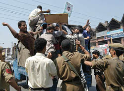 The police arrests activists of the Jammu-Kashmir National Front during a protest rally in Srinagar on Friday.