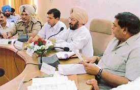 Finance Minister Lal Singh presides over a District Planning Board meeting in Ludhiana