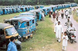 Autorickshaws parked at the Dasehra ground in Phase VIII of Mohali on Sunday due to a strike by the SAS Auto Drivers Union