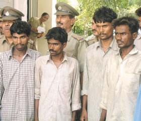 The four persons accused in a blackmail and kidnap racket
