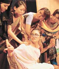 Japanese artist perform in the play Saavdhan Saasu Ji at the Pracheen Kala Kendra, Sector 35