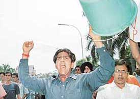 Activists of the Akhil Bharatiya Vidyarthi Parishad take out a protest rally against the shortage of water in hostels at Panjab University campus