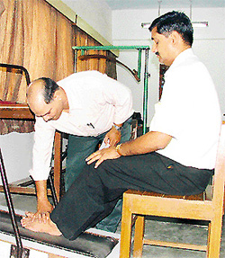 A patient undergoes treatment at the Pandit Deen Dayal Upadhyaya Institute for the Physically Handicapped, New Delhi.