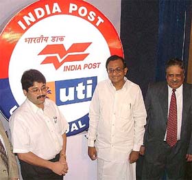 Dayanidhi Maran, Minister of Communications and IT, Finance Minister P. Chidambram and UTI Chairman M.Damodaran at signing of the Memorandum of Agreement between India Post and UTI Mutual Fund, in New Delhi