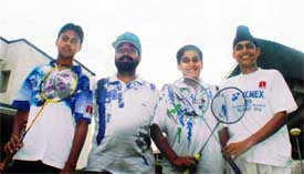 Ludhiana shuttlers, who excelled in the All-India Ranking Badminton Tournament held at Vadodra recently, with their coach
