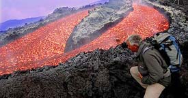 Lava and smoke rise from Mount Etna
