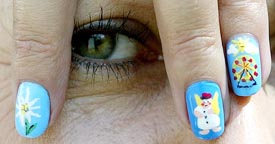 Ingrid Schneider, a make-up artist specialising in finger nail designs, presents her nails painted with Oktoberfest motives
