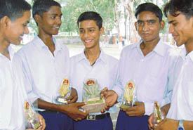 Prize winners of Hindi Day contests are all smiles at Government Model High School, Sector 20, Chandigarh, on Tuesday. 