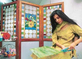 Namita, a city-based artist displays the Tiffany technique of making stained glass items. 