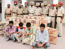 Four persons who were arrested by the police on Wednesday on the charge of smuggling liquor in Ludhiana. 