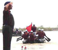 Lt Gen PK Singh, GOC, Vajra Corps, takes the salute from the passing rafts in an expedition in the Beas at Mirhal