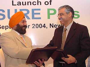 Sunil Kant Munjal, MD, Hero Corporate Service Ltd. and H. S. Wadhwa , Chairman and MD, National Insurance Company Ltd at the launch of Nsure Plus, thier joint strategic insurance initative, in New Delhi on Thursday.