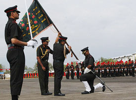 The Army Chief, Gen N.C. Vij, presents regimental colours to the Jammu and Kashmir Light Infantry in Srinagar