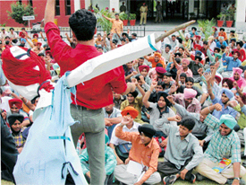 Students of Guru Nanak Dev Engineering College demonstrate against Dr J.N. Jha on Thursday
