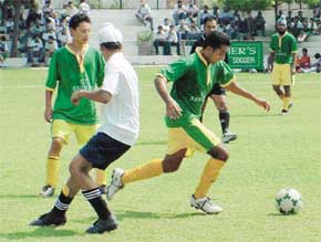 Players of St Xaviers School, Sector 44, and St Peters Secondary School in action in the six-a-side football meet played in Chandigarh on Friday. 