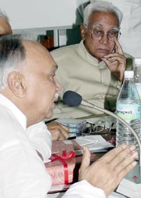 Punjab Finance Minister Surinder Singla speaks about Mr P.N. Haksar while Haryana Governor A.R. Kidwai looks on at a function organised at the Centre for Research in Rural and Industrial Development in Chandigarh