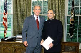 Newly appointed Indian ambassador to the USA Ronen Sen poses for a photograph with President George W Bush after presenting his credential in Washington on Thursday. 