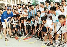 Mr Jarkko Harkonen of Finland with youngsters at the 6th National Floorball training camp at DAV Senior School, Sector 8, Chandigarh