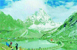 The Manimahesh lake. On the backdrop is Mount Kailash