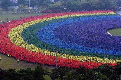 Some 31,000 students, faculties and employees from Polytechnic University of the Philippines form a human rainbow