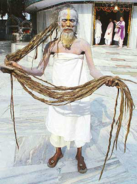 Tanuklaldas Baba Jatadhari shows his 10-foot-long hair during a visit to Pracheen Shiv Mandir, Sector 9, Panchkula.